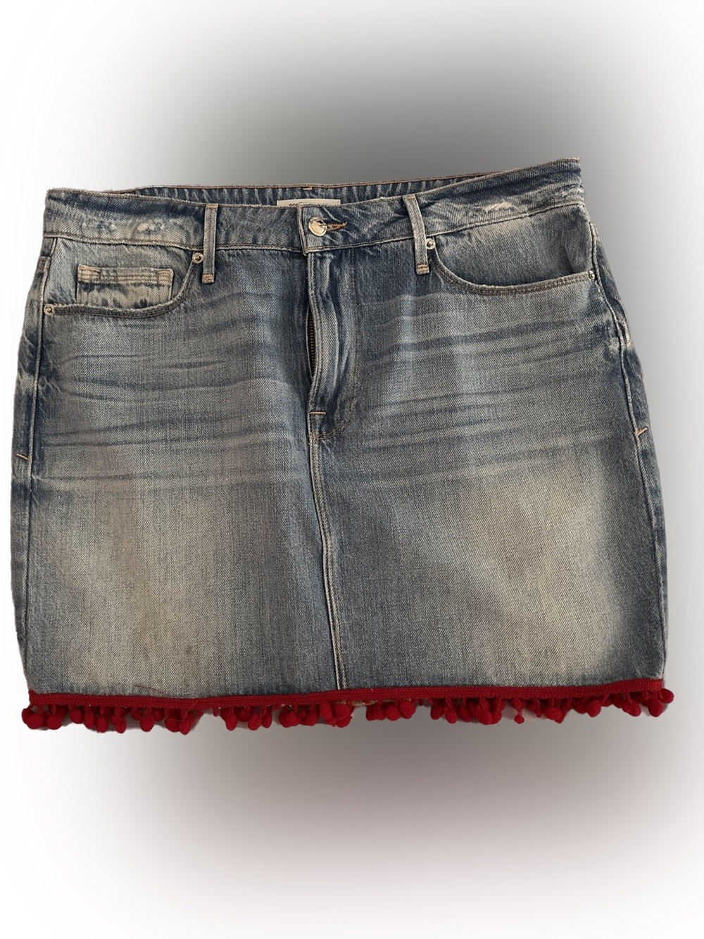 Good American Light Blue Denim Mini Skirt with Red Pom Trim